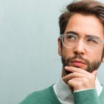 young-handsome-entrepreneur-man-face-closeup-doubting-confused-thinking-idea-worried-about-something_1187-14796