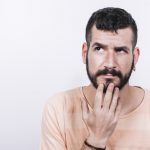 serious-man-thinking-looking-up_23-2147799041