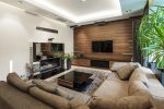 Sala de estar moderna de imóvel de alto padrão adquirido com consórcio imobiliário