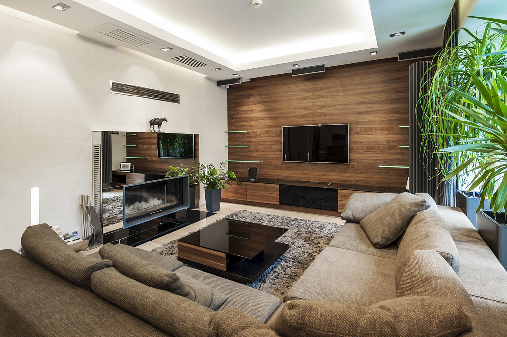 Sala de estar moderna de imóvel de alto padrão adquirido com consórcio imobiliário